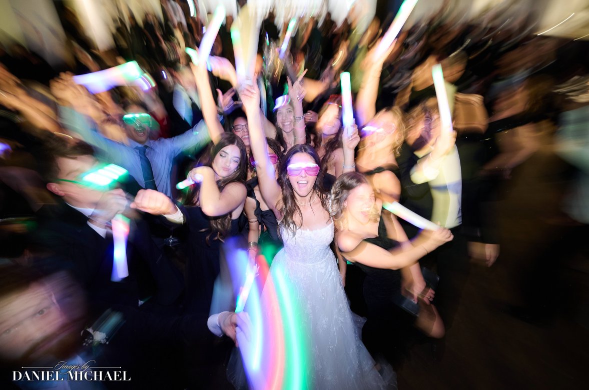 Motion Blur Wedding Reception Candid with Glow Sticks